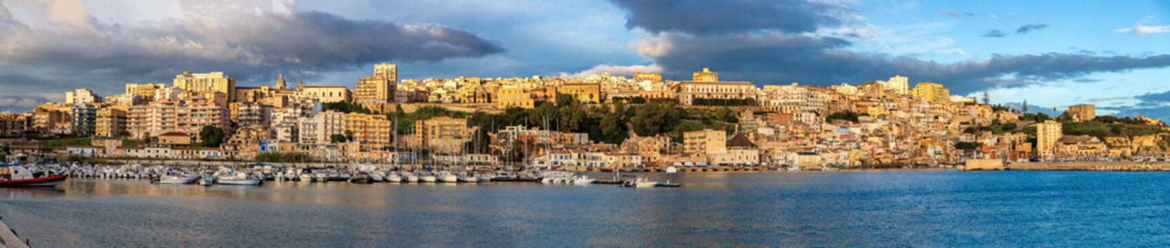 Panoramic view of coastline in city Sciacca Italy at sunset.
