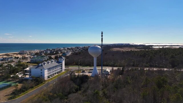 Cinematic Aerial Orbit on Water Tower and Communications Mast in Sandbridge, Virginia Beach