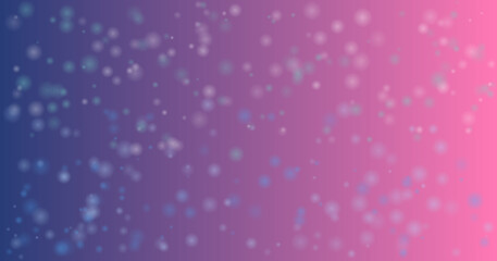 Soft bokeh lights on a gradient background of blue and pink