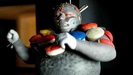 Artistic Character with Unique Design: Creative Performance in Fantasy Costume and Colorful Accessories for Imaginative Art and Visual Storytelling in Avant-Garde Fashion