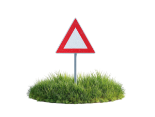 PNG of A cautionary traffic sign on a grassy mound, signaling drivers to be vigilant of potential hazards ahead.