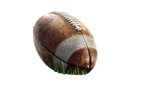 PNG of A close-up of a well-worn American football resting on lush green grass, showcasing its textured surface.
