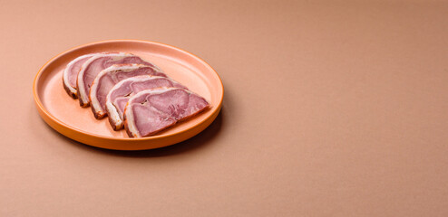 A meat roll made from pork or beef tongue slices with spices. Tongue roll