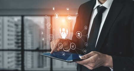 A concept of centralized business management and corporate strategy. A leadership team connecting to all functions like finance, operations, and planning. Motif