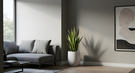 Modern living room interior with a grey sofa, a vibrant snake plant in a white pot, and abstract wall art, bathed in natural light