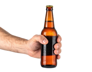 Close-up of a hand firmly gripping a bottle of amber-colored beverage against black backdrop