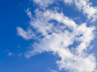 Wispy Cirrus Clouds over Clear Blue Sky