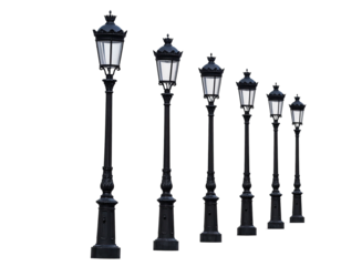 Black ornate lampposts illuminate against a black background, decreasing in height