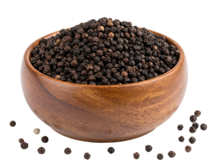 Close-up of black peppercorns in a wooden bowl, with scattered peppercorns
