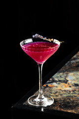 Cosmopolitan cocktail, cocktail with cherry. Ideal for close-up or top-view photography with a clean and stylish presentation.