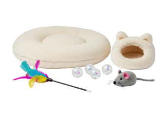 Two cream faux-sheepskin cat loungers and various toys (feather wand, crinkle balls, plush mouse) professionally displayed on a seamless white background with high-key lighting. Concept of premium