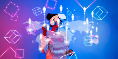 A user interacts with virtual reality technology in a vibrant and futuristic environment, representing concepts of global communication and digital connectivity. XDMCP