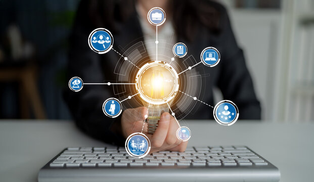 A business professional engages with digital icons in a modern office, showcasing technology, data analysis, and connectivity in today workspace environment. Crux - Powered by Adobe