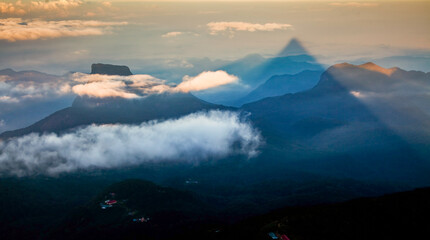 Shadow of the conical mountain Adam's Peak - sacred buddhist place