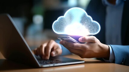 Faceless businessman using smartphone and laptop with cloud computing technology interface online data management system secure file transfer platform digital business - Powered by Adobe