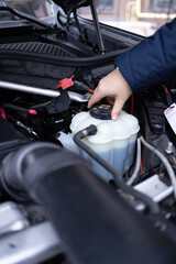 repair of a passenger car at a service station