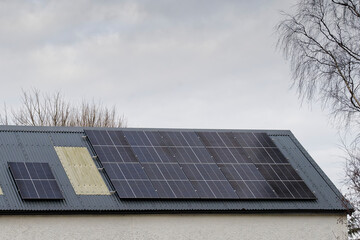 Solar panels installed on home roofs at new housing development