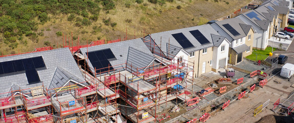 Solar panels installed on home roofs at new housing development
