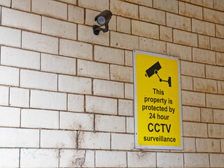 CCTV in operation 24 hours premises protected sign