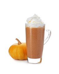Delicious pumpkin latte with whipped cream in glass and fresh vegetable isolated on white