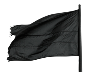A stark, isolated shot of a billowing, tattered black flag against a void background