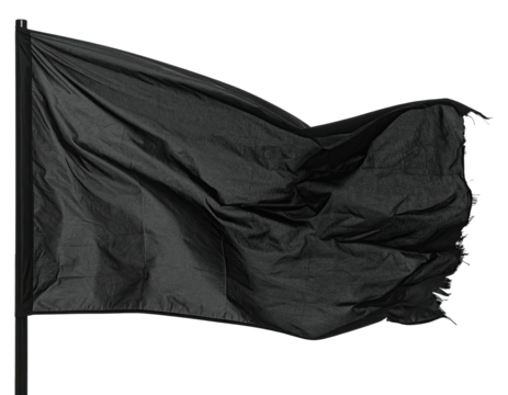 A black flag flies on a pole, billowing slightly in the wind, with frayed edges