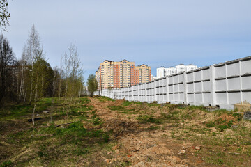 Fototapeta premium precast reinforced concrete fence consisting of individual panels,