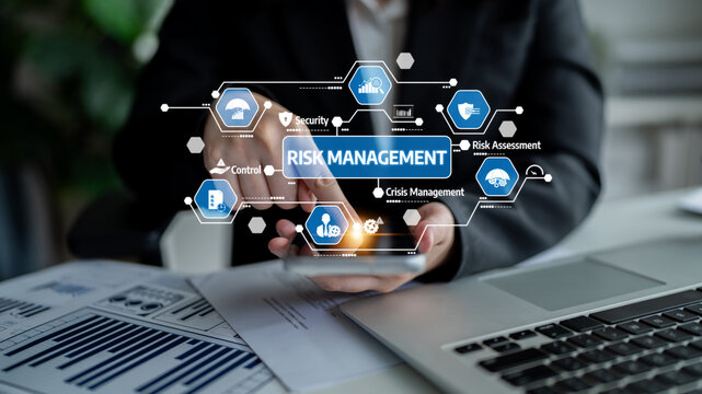 A business professional uses a smartphone to explore risk management concepts represented by digital icons. The scene captures the essence of modern data-driven strategies. Tessel