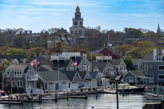 Aerial view of the town with the iconic church steeple rising above the historic buildings, a symphony of architectural heritage, Nantucket, Massachusetts, United States.