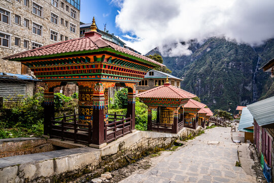 Khurde, water prayer wheels with mantra "om mani padme hum", on the Namche bazar street.
