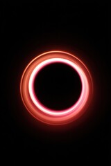 Glowing red ring in darkness with vibrant light trails