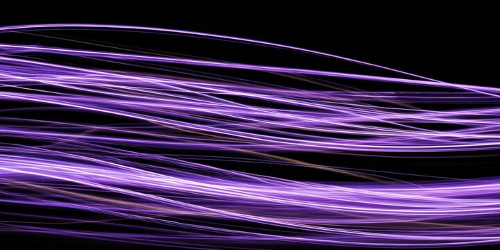 Mesmerizing purple light trails on black background - Powered by Adobe