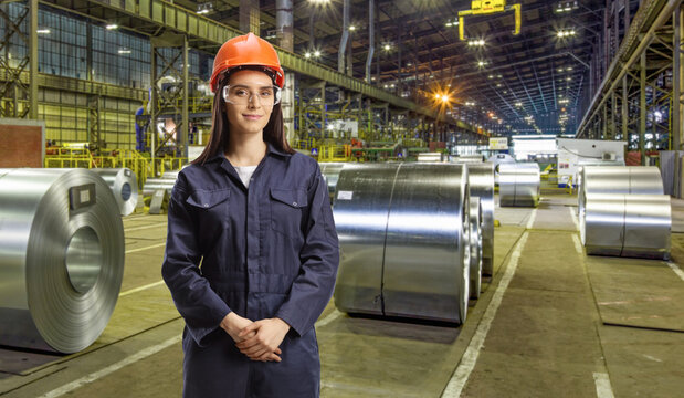 Young female technician with a helmet and goggles - Powered by Adobe