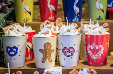 Decorative candles in ceramic coffee mugs, Strasbourg Christmas market, France