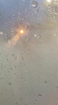 Vertical video. A deicing machine sprays special anti-icing fluids onto an aircraft wing. Amsterdam, Netherlands.