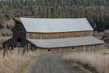 photo of large old wooden barn on a farm or ranch in Idaho