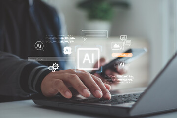 Man using laptop and smartphone with glowing AI interface icons, representing modern artificial intelligence technology, digital innovation, data processing and smart automation in everyday workflow.