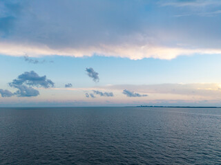 Calm horizon at sea. Romantic summer vacation seascape. Seascape horizon paradise. Sea sunrise on ocean beach. Sunset seascape at summer vacation. Horizon with sea cloudy sky. Stormy sea