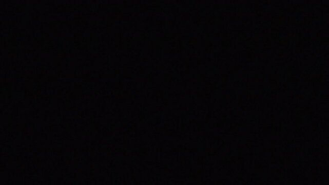 Cinematic Light Leak Overlay Transition with Gentle Bokeh, Lens Flare, and Analog Grain Effect Background