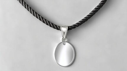 Elegant silver pendant necklace on a dark rope chain for casual wear