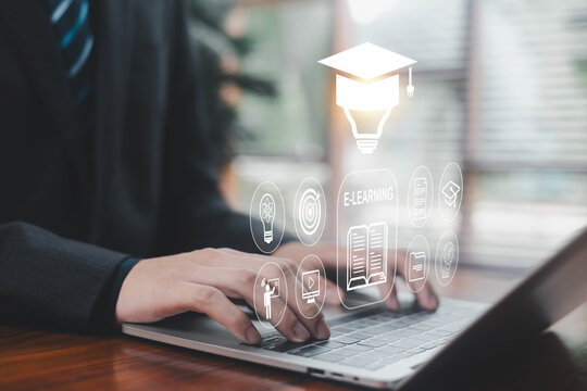 A professional using a laptop with glowing e-learning icons representing online education, digital courses, virtual training, and modern learning technology for remote study and skill development.
