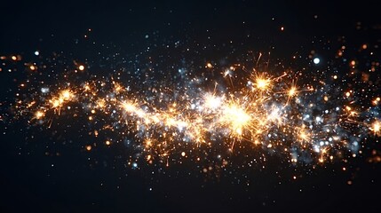 Golden particles and blue glitter forming sparkling lights against a dark background, generating a festive and abstract design suitable for celebration or holiday themes