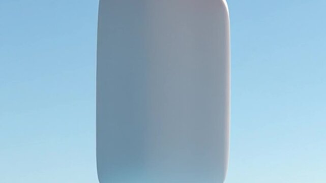 Minimalist white monolith soaring into azure sky