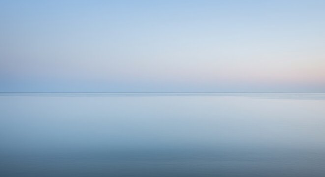 A serene, pale blue expanse of water meeting a soft, pastel sky - Powered by Adobe