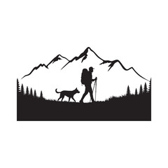 Silhouette of hiker and dog in mountain landscape