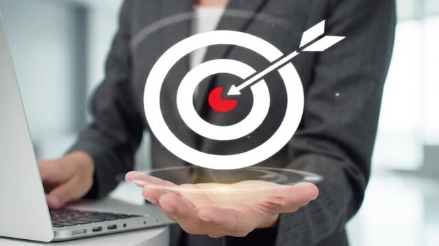Business Target Achievement and Success Strategy. Precision Goal Planning with Digital Icon. Professional Holding Bullseye Target Symbol.