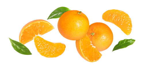 Fresh tangerines and green leaves falling on white background. Citrus fruit