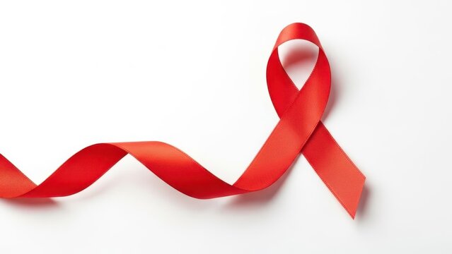 Red awareness ribbon symbol for hiv aids on a white background, isolated on white background