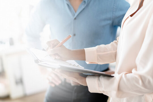 Business meeting clipboard discussion image