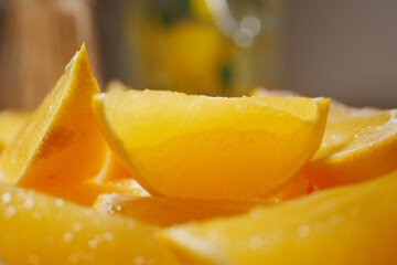 Freshly sliced lemons arranged on a wooden table